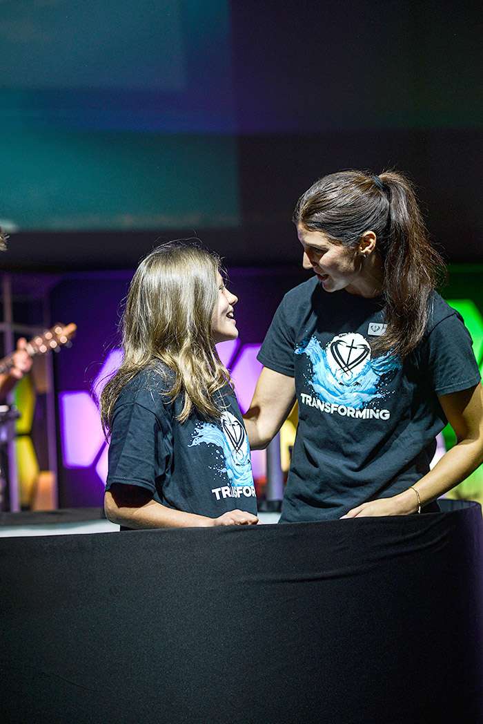 Jenny Slovinski smiling during Baptism Sunday at Heartland Community Church in Medina, Ohio